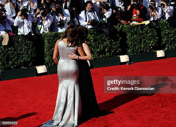 Actress Mariska Hargitay and Tina Fey arrive at the 61st Primetime Emmy Awards held at the Nokia Theatre on September 20, 2009 in Los Angeles,...