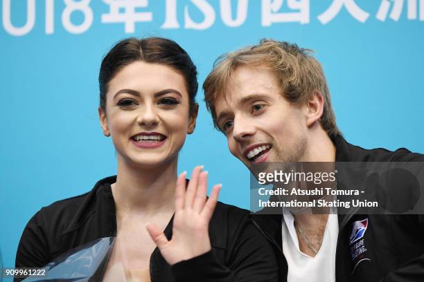 Kaitlin Hawayek and Jean-Luc Baker of the USA smile at kiss and cry after competeing in the ice dance free dance during day two of the Four...
