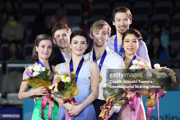 Carolane Soucisse and Shane Firus of Canada , Kaitlin Hawayek and Jean-Luc Baker of the USA , Kana Muramoto and Chris Reed of Japan pose on the...