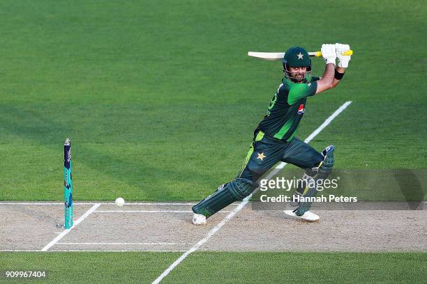 Ahmed Shehzad of Pakistsn cuts the ball away for four runs during the International Twenty20 match between New Zealand and Pakistan at Eden Park on...