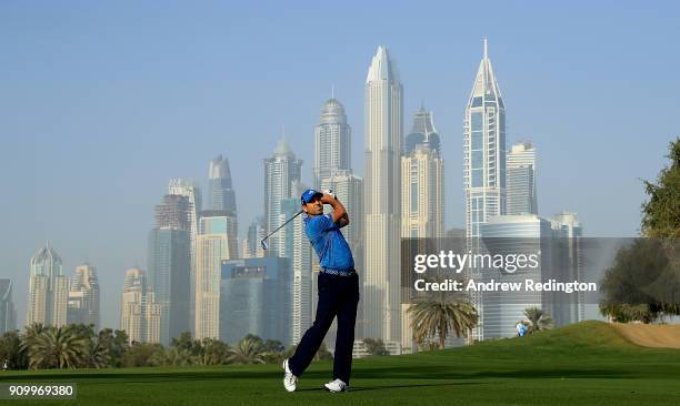 Sergio Garcia hits his second shot on the 13th hole during round one of the Omega Dubai Desert Classic at Emirates Golf Club on January 25, 2018 in...