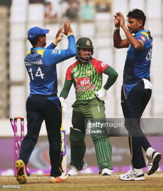 Sri Lanka Cricketer Lakmal celebrates after the dismissal of Bangladeshi batsman Anamul Haque during the sixth One Day International match in the...