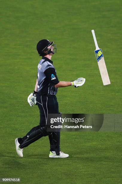 Colin Munro of the Black Caps walks off after being dismissed by Mohammad Amir of Pakistan during the International Twenty20 match between New...