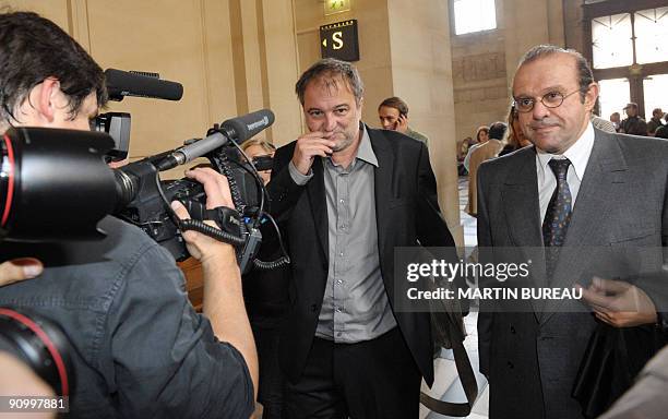 The journalist who broke the story Denis Robert arrives with his lawyer Herve Temime for the opening of the so-called "Clearstream affair" trial, on...