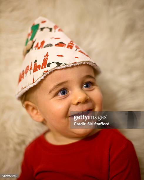 young boy dressed as elf for holidays - siri stafford fotografías e imágenes de stock