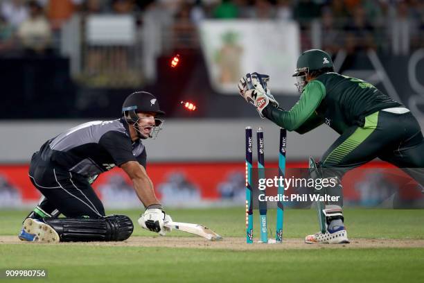 Colin de Grandhomme of the Blackcaps is stumped by Sarfraz Ahmed of Pakistan during the International Twenty20 match between New Zealand and Pakistan...