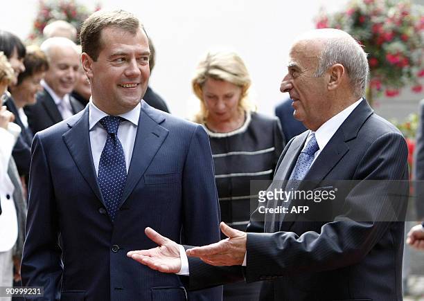 Russian President Dmitry Medvedev and his wife Svetlana are welcomed by Swiss President Hans-Rudolf Merz upon arrival at the Lohn residency in...