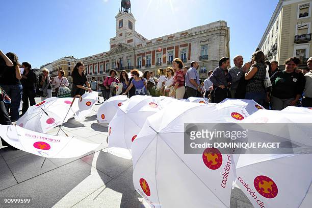 Environmental activists of Spanish movement "Coalicion Clima" demonstrate against global warming climate on September 21, 2009 in center of Madrid....
