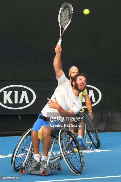 Adam Kellerman of Australia and Stefan Olsson of Sweden compete in the Men's Wheelchair Doubles semi-final against Stephane Houdet of France and...