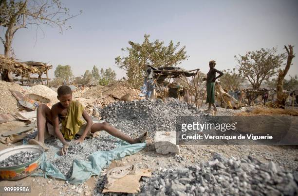 In this gravel-pit, hundreds of people are working in horrendous conditions and many of them are children. Instead of going to school, they are...