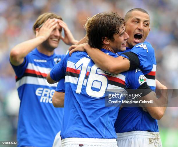 Marius Stankevicius, Andrea Poli and Angelo Palombo of UC Sampdoria celebrate the fourth goal scored by Marco Padalino during the Serie A match...