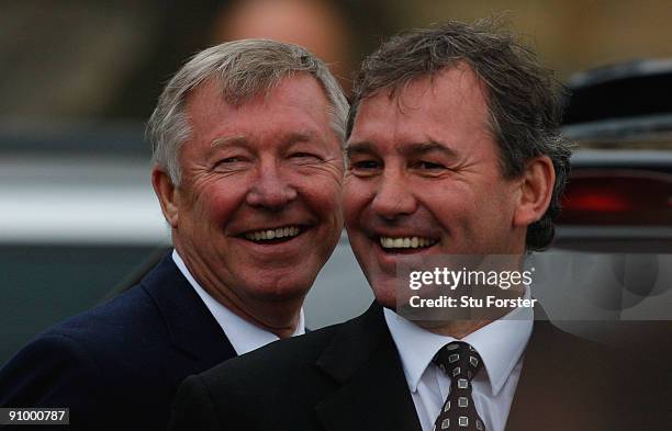 Manchester United manager Sir Alex Ferguson and Former England footballer Bryan Robson share a joke after the Sir Bobby Robson Memorial Service at...