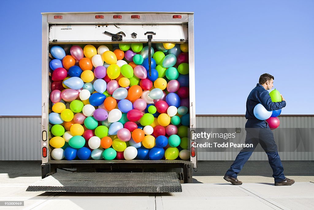 Man Delivering Balloons