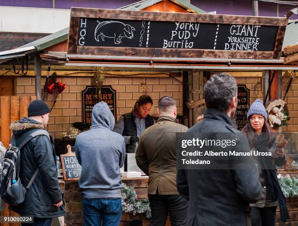 england, manchester, food stall - christmas market - waitress booth stock pictures, royalty-free photos & images