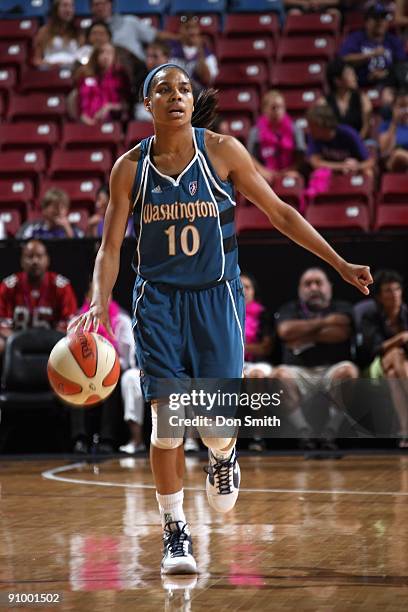 Lindsey Harding of the Washington Mystics brings the ball upcourt against the Sacramento Monarchs during the WNBA game on August 22, 2009 at ARCO...