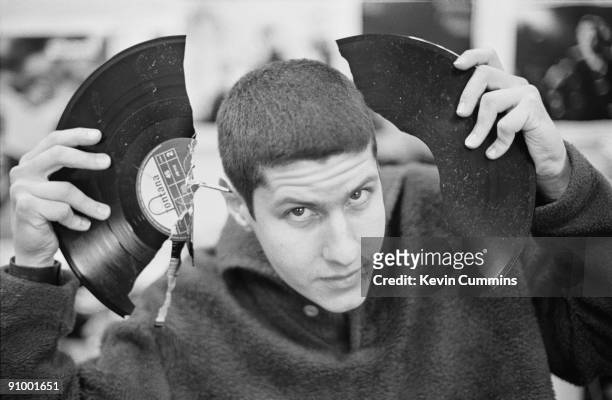 Adam Ad-Rock' Horovitz, of American hip-hop group the Beastie Boys holding a broken 12-inch single during a session as guest reviewer of the latest...