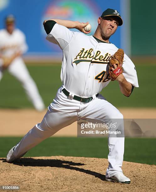 Michael Wuertz of the Oakland Athletics pitches against the Cleveland Indians during the game at the Oakland-Alameda County Coliseum on September 19,...