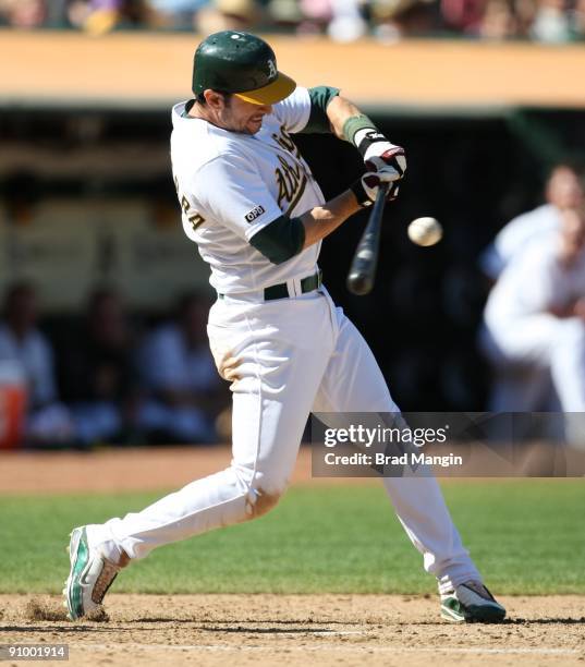 Nomar Garciaparra of the Oakland Athletics bats against the Cleveland Indians during the game at the Oakland-Alameda County Coliseum on September 19,...