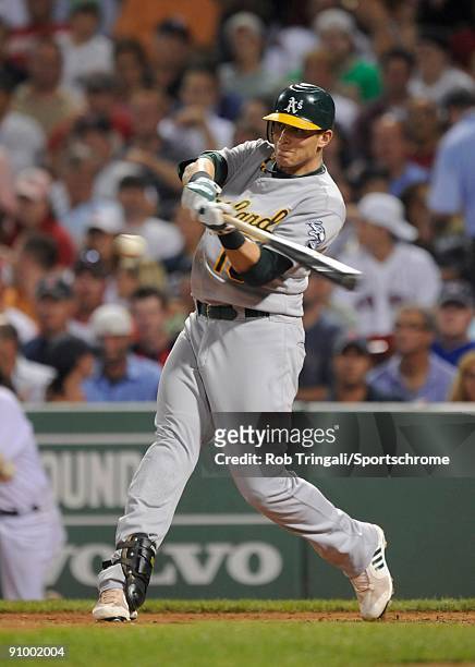 Mark Ellis of the Oakland Athletics bats against the Boston Red Sox at Fenway Park on July 29, 2009 in Boston, Massachusetts The Athletics defeated...