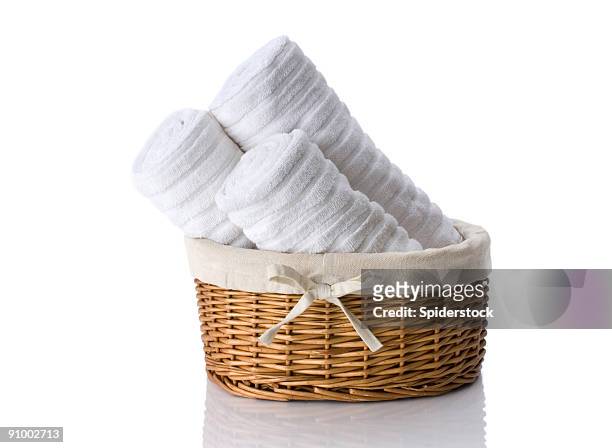 towels in  basket - towel stock pictures, royalty-free photos & images
