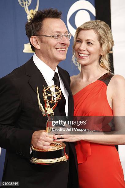 Actors Michael Emerson and Carrie Preston poses in the press room at the 61st Primetime Emmy Awards held at the Nokia Theatre on September 20, 2009...