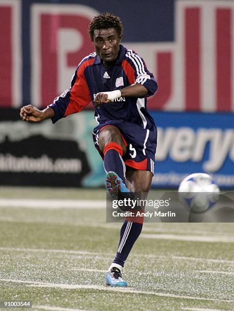 Emmanuel Osei of the New England Revolution plays the ball against the New York Red Bulls during their game at Giants Stadium on September 18, 2009...