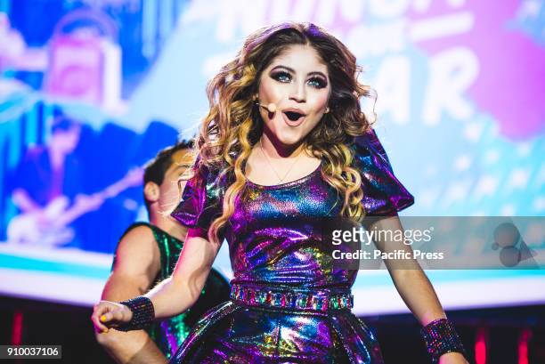 The Mexican teen idol Karol Sevilla, better known as Luna Valente, performing live on stage for her first Italian "Soy Luna" show in Torino, in a...