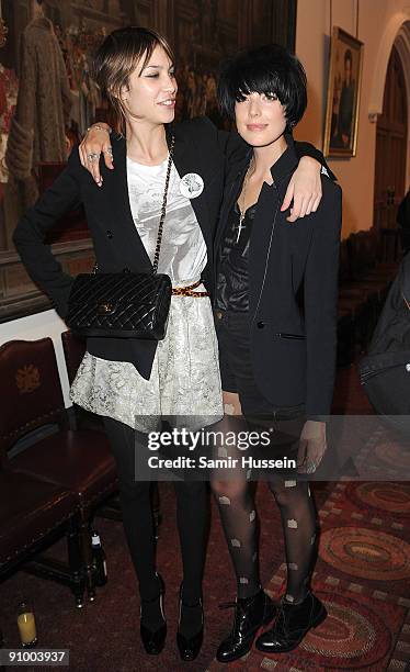 Agyness Deyn and Alexa Chung pose backstage ahead of the House of Holland fashion show at the Guildhall during London Fashion Week on September 21,...
