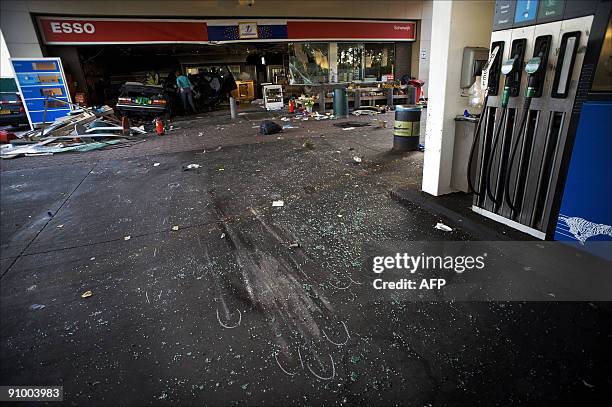 Petrol station on the motorway A27 is pictured after two cars drove into its shop between the Dutch cities of Meerkerk and Gorinchem on September 21,...