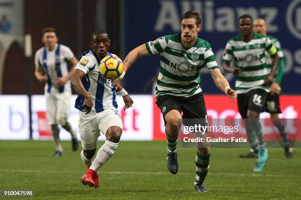 Porto forward Majeed Waris from Ghana with Sporting CP defender Sebastian Coates from Uruguay in action during the Taca da Liga Semi Final match...