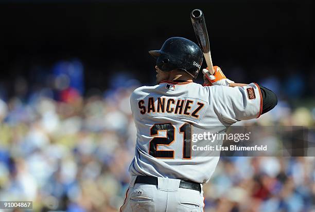 Freddy Sanchez of the San Francisco Giants bats against the Los Angeles Dodgers at Dodger Stadium on September 19, 2009 in Los Angeles, California....