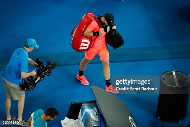 Kyle Edmund of Great Britain walks off the court after losing his semi-final match against Marin Cilic of Croatia on day 11 of the 2018 Australian...
