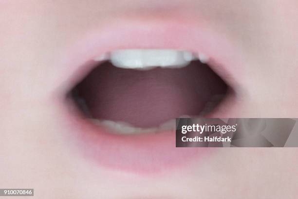 close up of womans mouth opened - mouth talking stock pictures, royalty-free photos & images