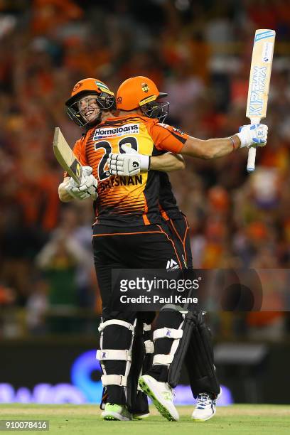 Adam Voges and Tim Bresnan of the Scorchers celebrate winning the Big Bash League match between the Perth Scorchers and the Adelaide Strikers at WACA...