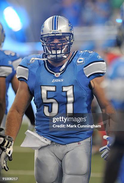 Dominic Raiola of the Detroit Lions looks on during player introductions before the game against the Minnesota Vikings at Ford Field on September 20,...