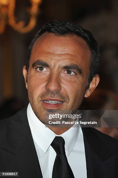 Nikos Aliagas poses as he arrives to attend the "Par Coeur Gala" dinner at the Hotel Meurice on September 21, 2009 in Paris, France.