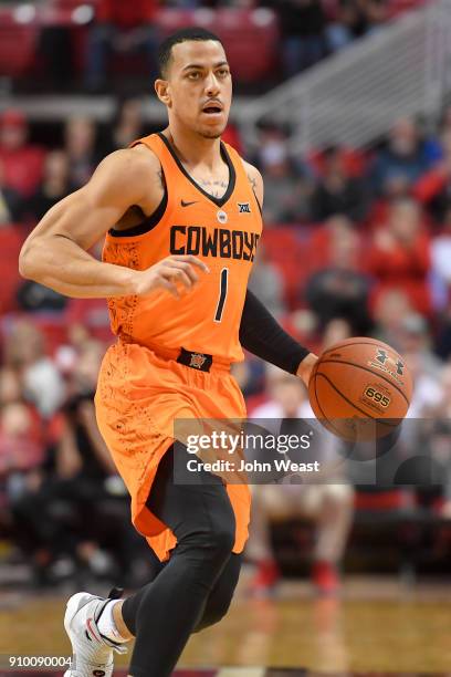 Kendall Smith of the Oklahoma State Cowboys handles the ball during the game against the Texas Tech Red Raiders on January 23, 2018 at United...