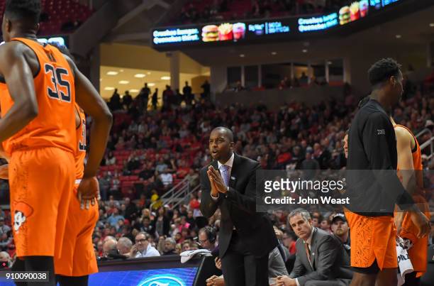 Head coach Mike Boynton of the Oklahoma State Cowboys instructs his team during the game between the Texas Tech Red Raiders and the Oklahoma State...