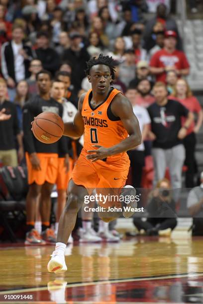 Brandon Averette of the Oklahoma State Cowboys brings the ball up court during the game against the Texas Tech Red Raiders on January 23, 2018 at...