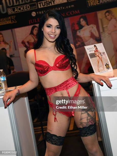 Adult film actress Gina Valentina poses at the Jules Jordan Video booth at the 2018 AVN Adult Entertainment Expo at the Hard Rock Hotel & Casino on...