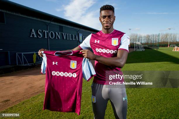 New signing Axel Tuanzebe of Aston Villa poses for a picture at the club's training ground at Bodymoor Heath on January 25, 2018 in Birmingham,...