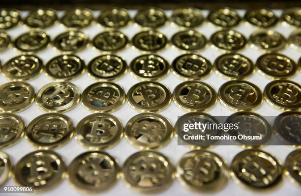 Brass bitcoin medals produced by Sakamoto Metal are seen at a workshop on January 25, 2018 in Tokyo, Japan. Sakamoto Metal, a custom medal, coin and...
