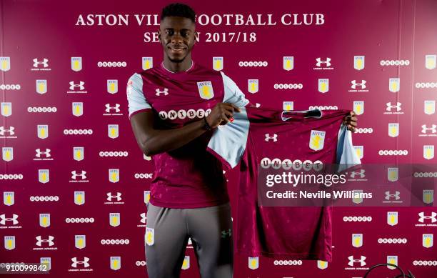 New signing Axel Tuanzebe of Aston Villa poses for a picture at the club's training ground at Bodymoor Heath on January 25, 2018 in Birmingham,...