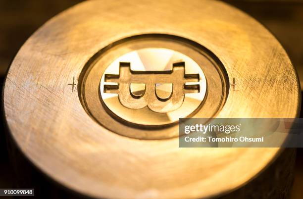 Metal mold for the bitcoin medal produces by Sakamoto Metal is seen at the company's workshop on January 25, 2018 in Tokyo, Japan. Sakamoto Metal, a...