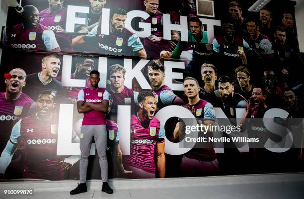 New signing Axel Tuanzebe of Aston Villa poses for a picture at the club's training ground at Bodymoor Heath on January 25, 2018 in Birmingham,...