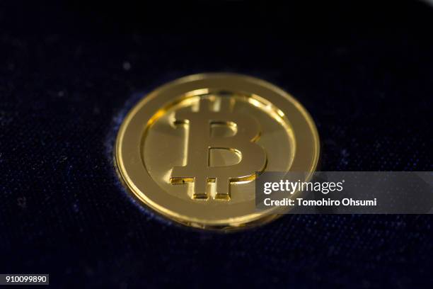 Gold Bitcoin Ver 2.0 gold medal produced by Sakamoto Metal is seen at a workshop on January 25, 2018 in Tokyo, Japan. Sakamoto Metal, a custom medal,...