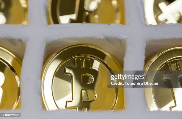 Brass bitcoin medals produced by Sakamoto Metal are seen at the company's workshop on January 25, 2018 in Tokyo, Japan. Sakamoto Metal, a custom...