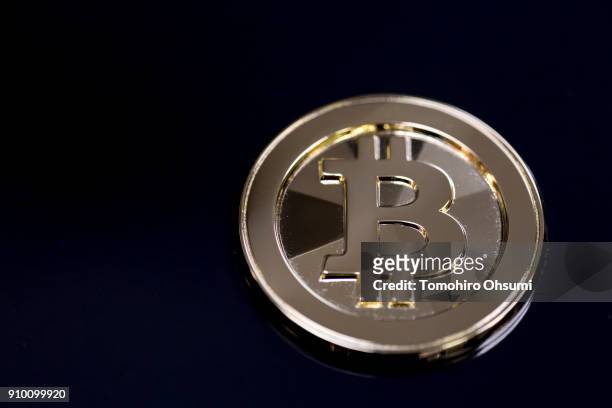 Brass bitcoin medal produced by Sakamoto Metal is seen at the company's workshop on January 25, 2018 in Tokyo, Japan. Sakamoto Metal, a custom medal,...