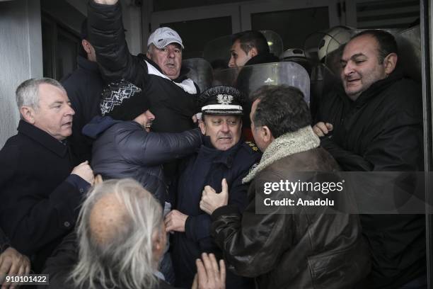 Security forces clash with protesters, as they try to enter the building of Ministry of Health while doctors and public healthcare staff go on a four...