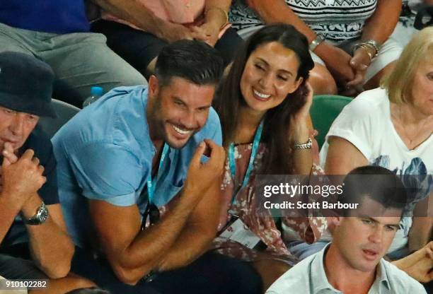 Sam Wood and Snezana Markoski watch the semi-final match between Marin Cilic of Croatia and Kyle Edmund of Great Britain on day 11 of the 2018...